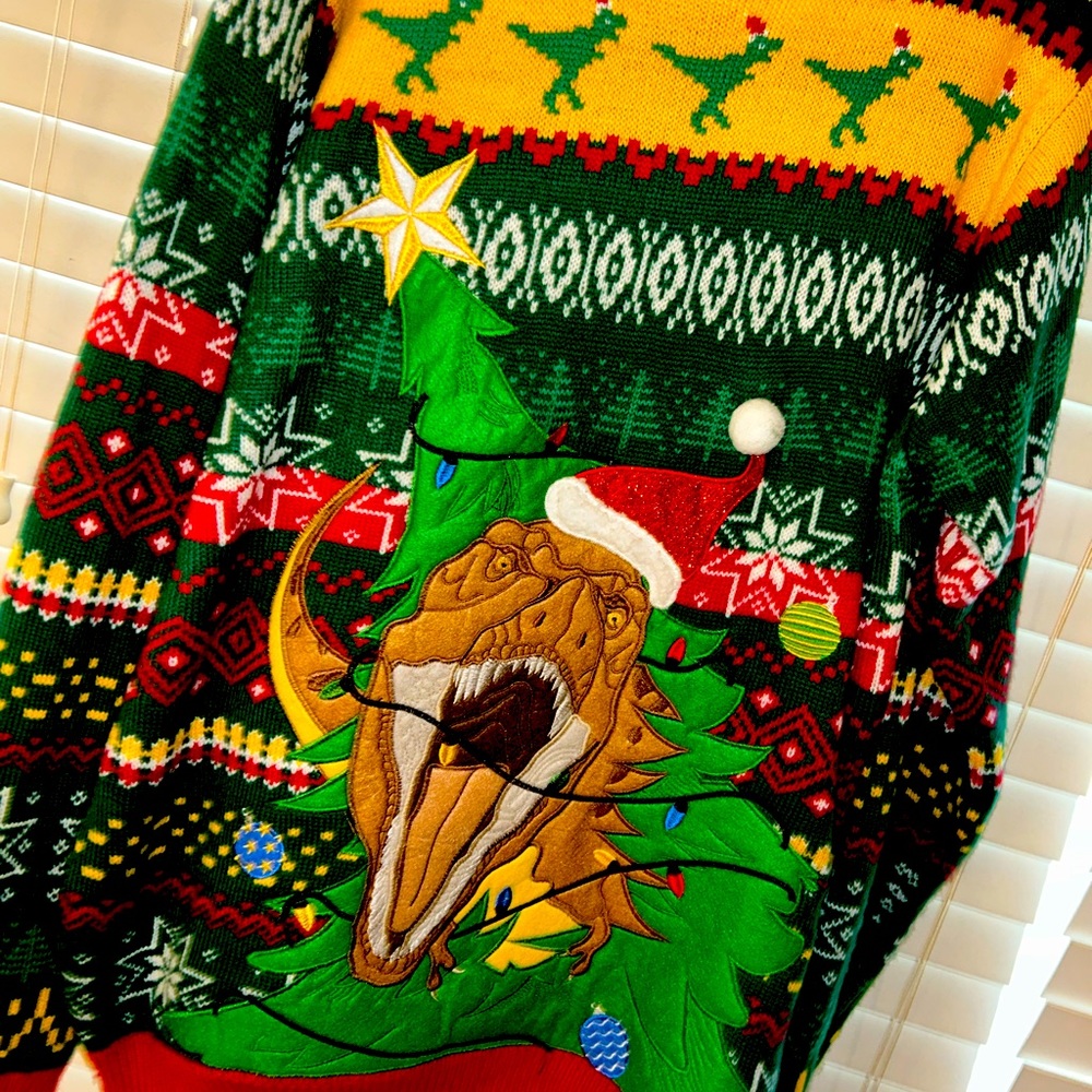 Woman’s Christmas dinosaur sweater